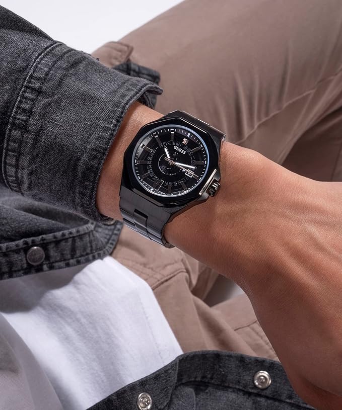 GUESS EMPEROR watch on wrist with denim and neutral tones styling