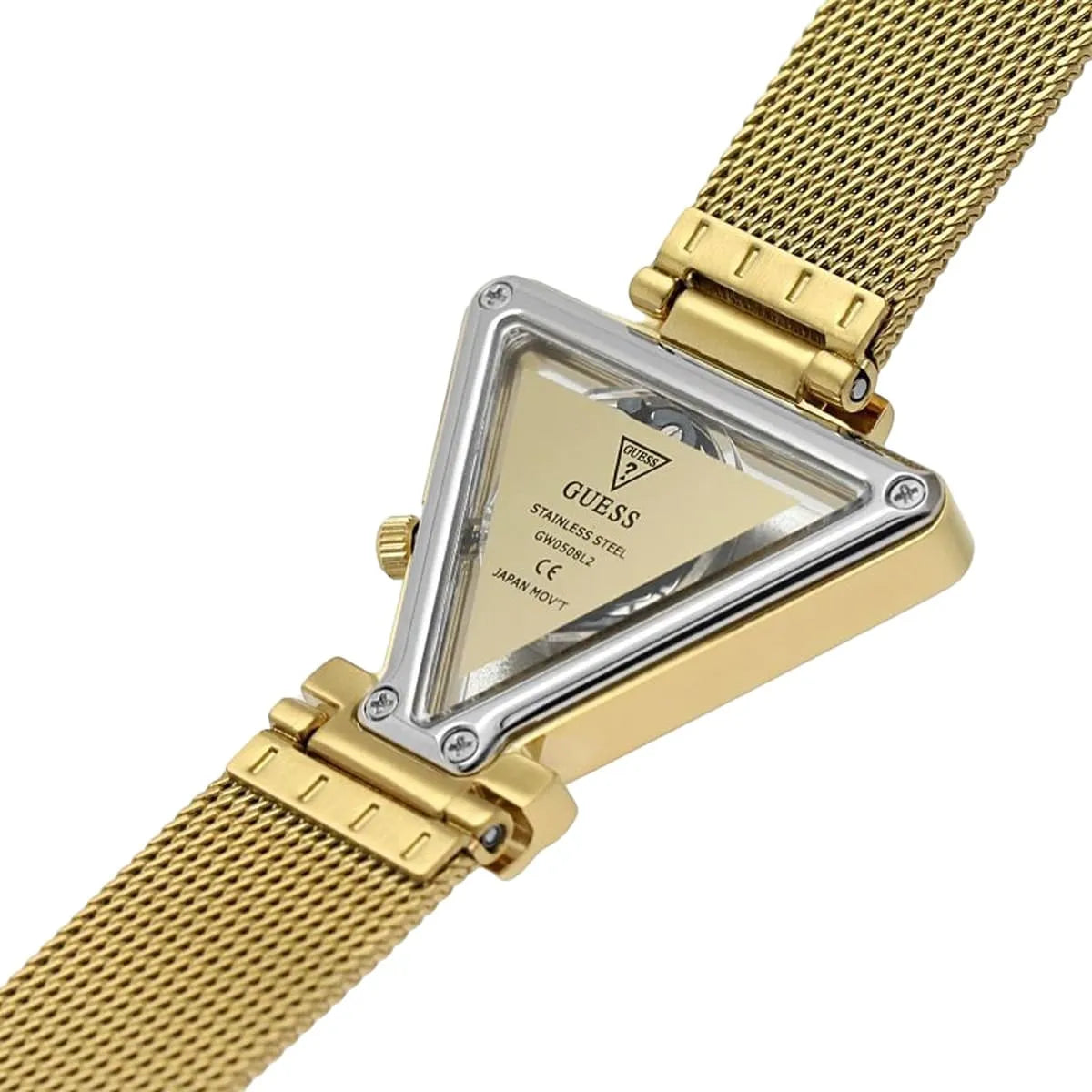 Guess Fame triangular gold watch worn on wrist with mesh band