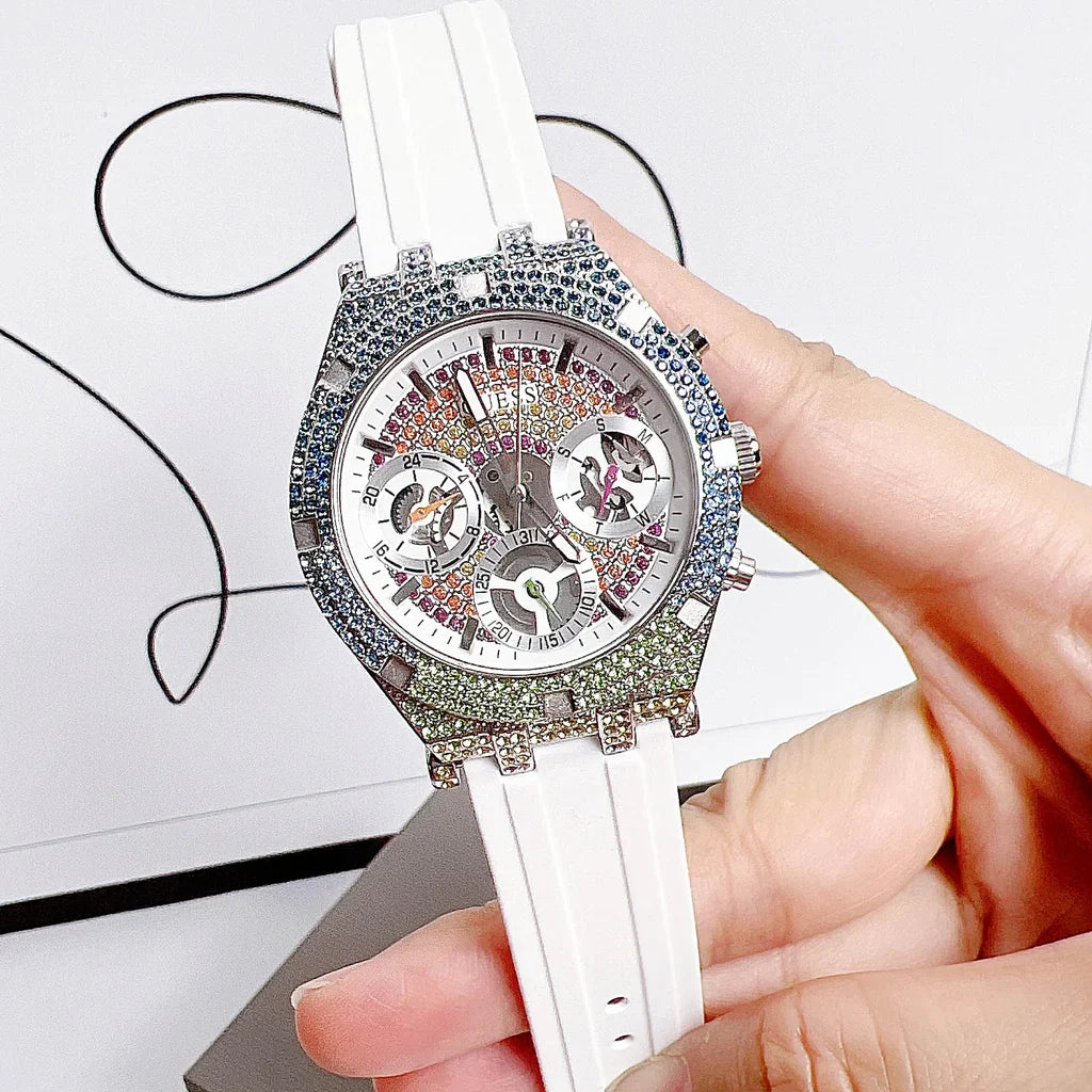 Guess GW0407L4 ladies watch on wrist with white strap and crystal bezel
