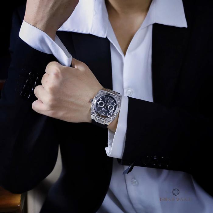 Guess GW0623G1 chronograph watch worn on wrist with diamond bezel detail visible