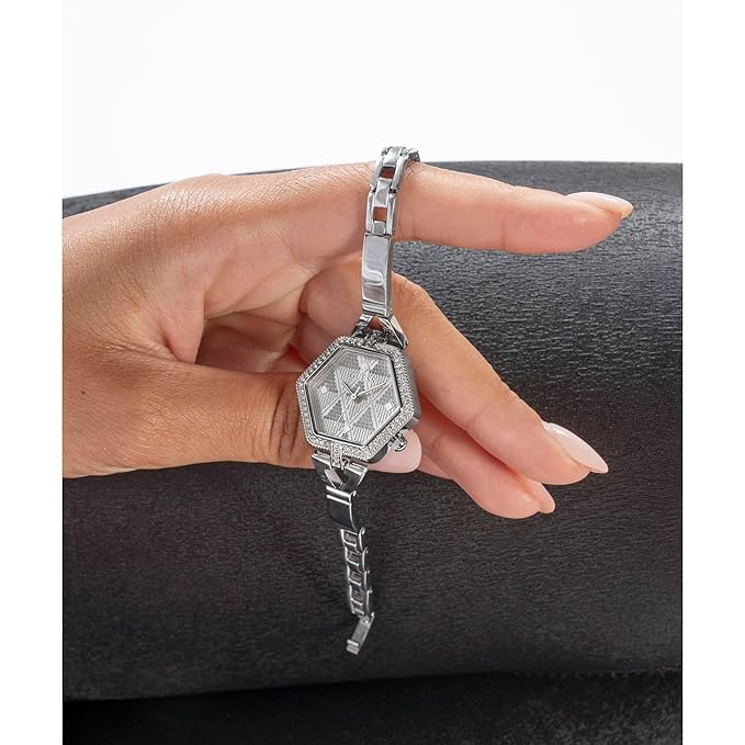 GUESS GW0680L1 silver watch on wrist held in hand