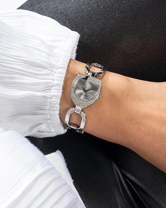 GUESS GW0683L1 silver-tone watch worn on wrist with crystal bezel