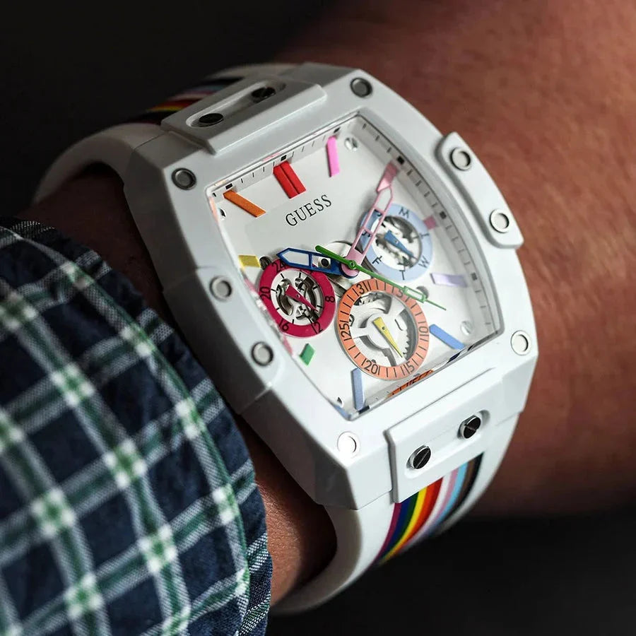 Guess Rainbow Watch on wrist showing white case with colorful dial and rainbow strap