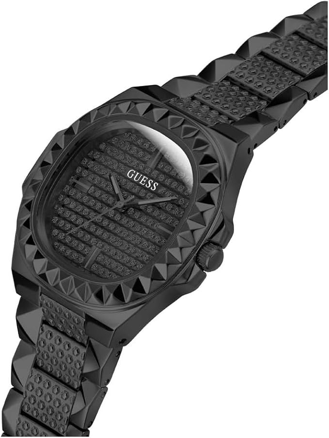 Angled view of Guess Rebel watch with studded case and textured dial on bracelet