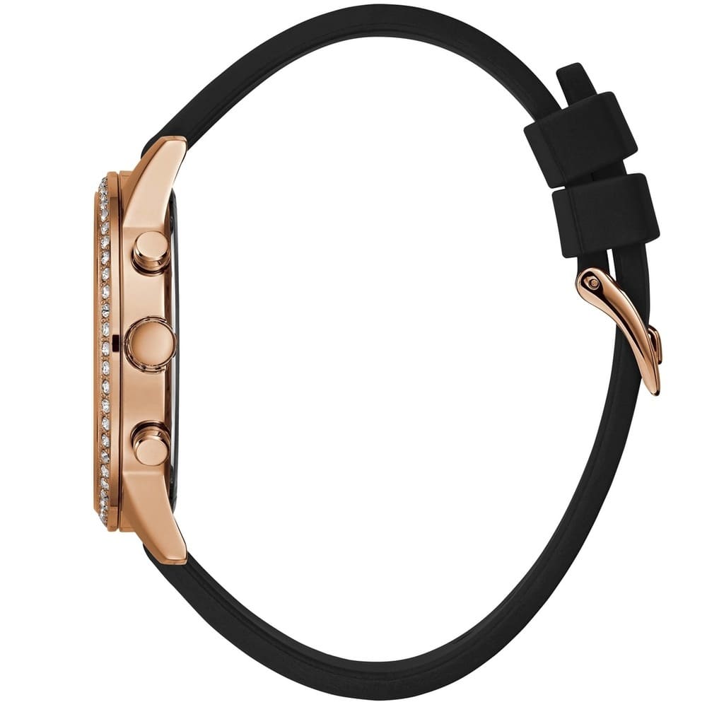 Side view of Guess Solar watch showing rose gold case with crystal-set bezel and black rubber strap