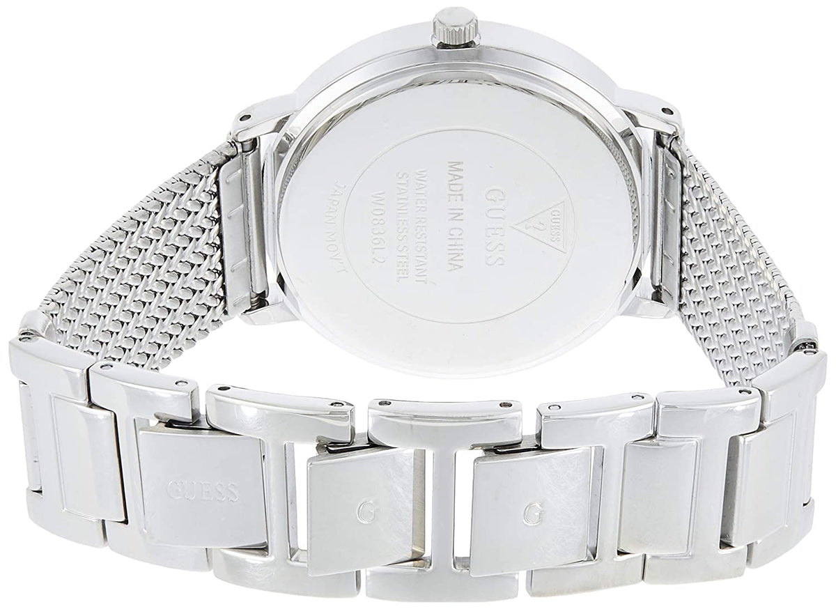 Guess W0836L2 watch caseback showing silver-tone case with mesh strap
