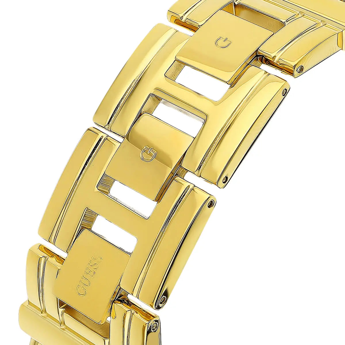 Close-up of gold watch case and chainlink strap connectors