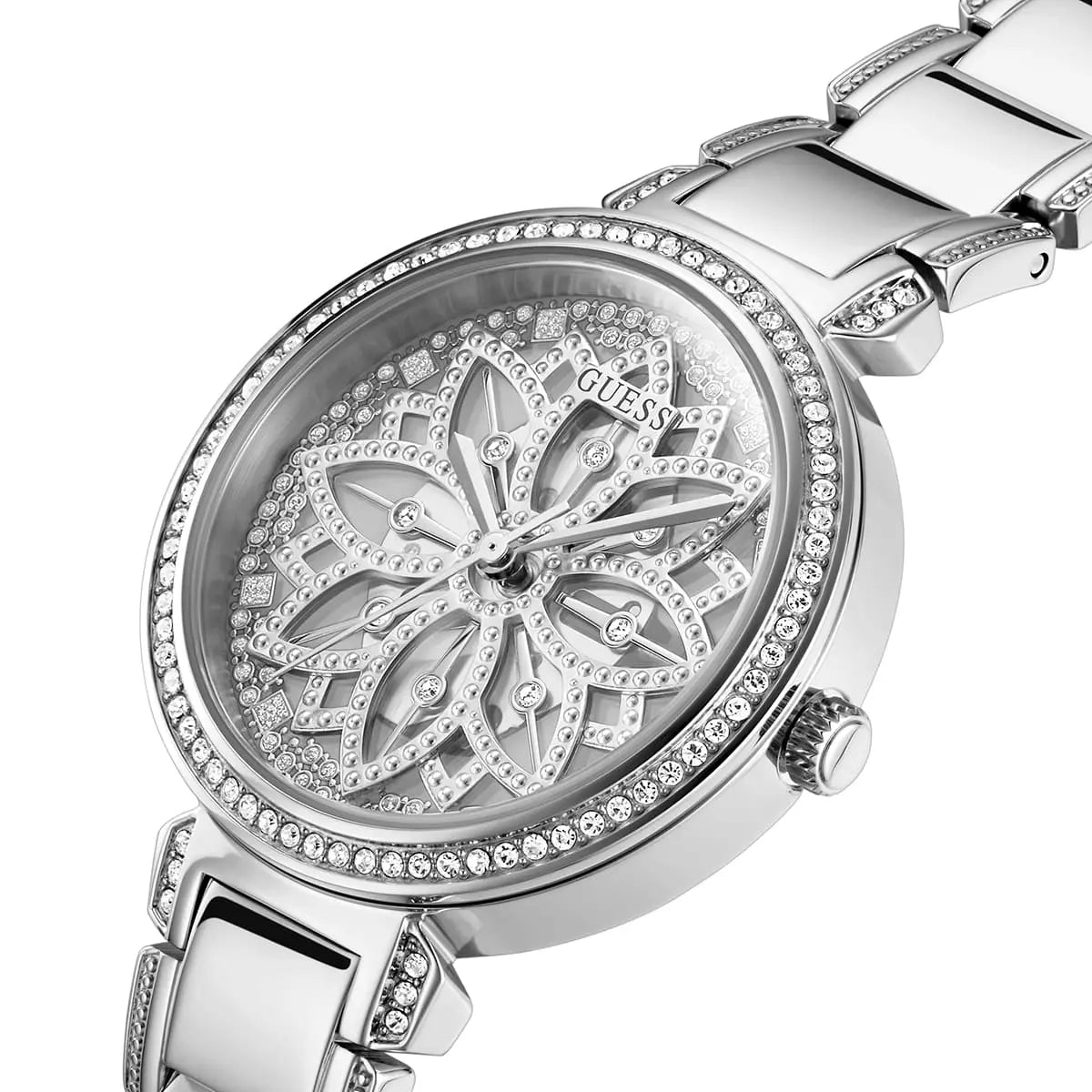 Guess Lily dial detail showing floral pattern with crystal-set bezel and steel bracelet