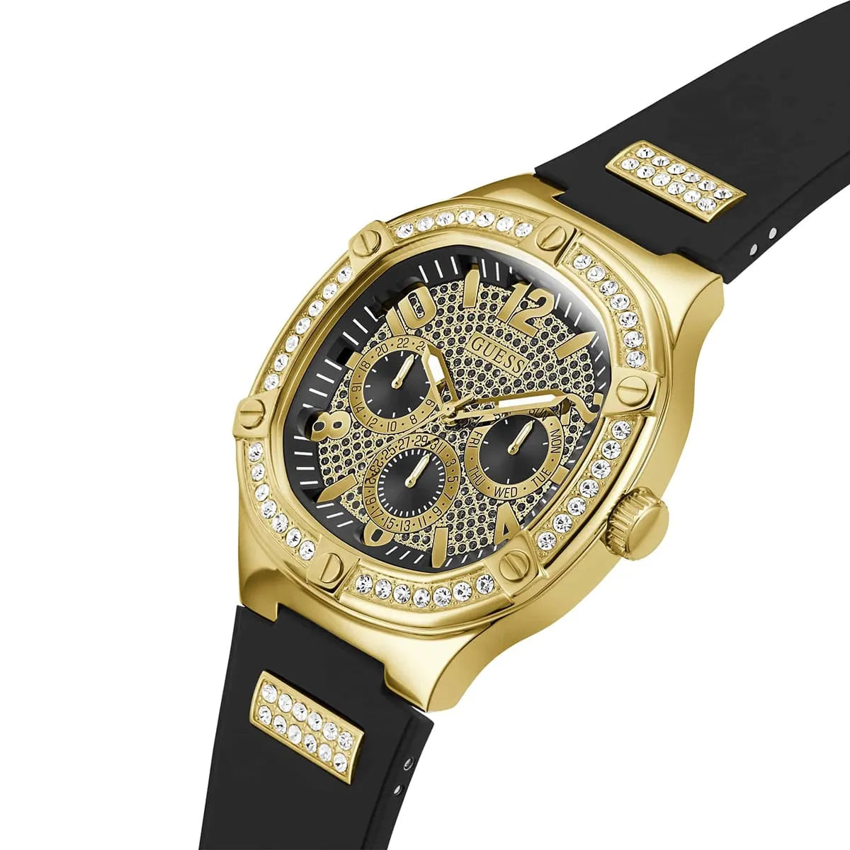Guess GW0641G2 chronograph watch worn showing gold case, three sub-dials, and black rubber strap