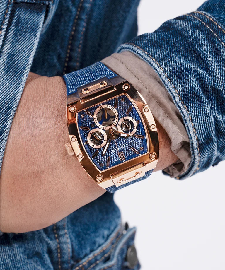On-wrist view of GUESS GW0786G2 showing chronograph functionality and denim strap
