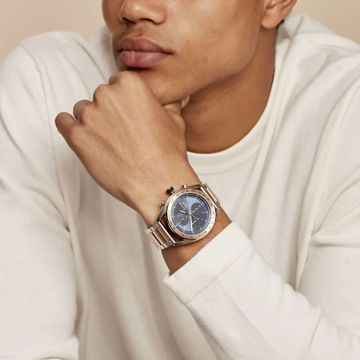 Hugo Boss chronograph men's watch on wrist showing blue dial and two-tone strap