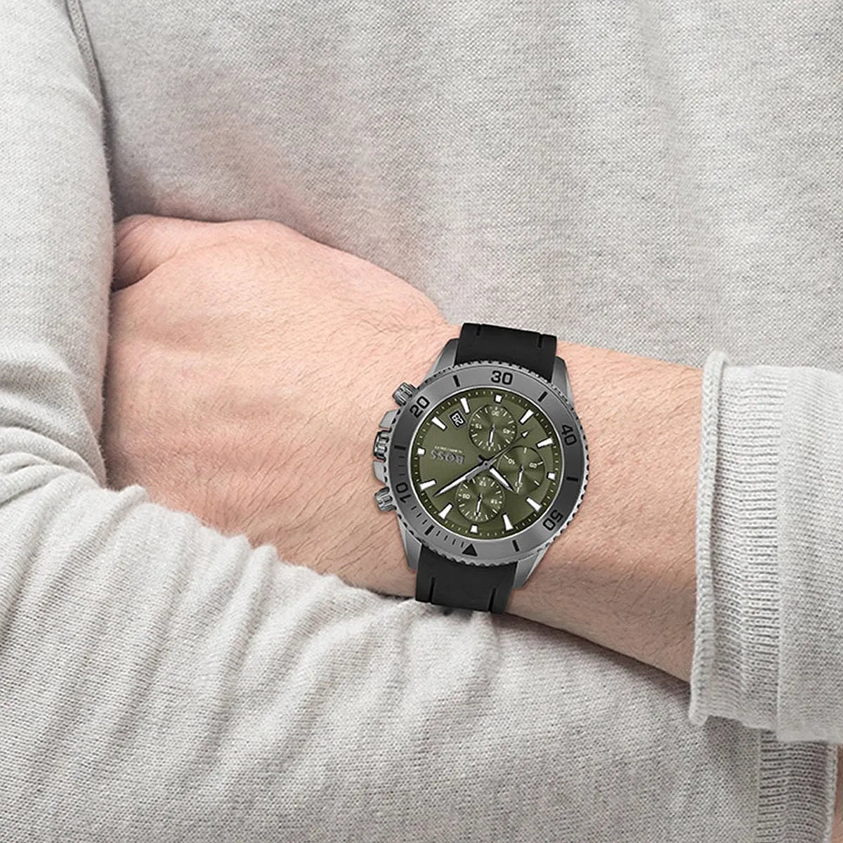 Hugo Boss Admiral watch on wrist showing green dial with chronograph subdials and rotating bezel