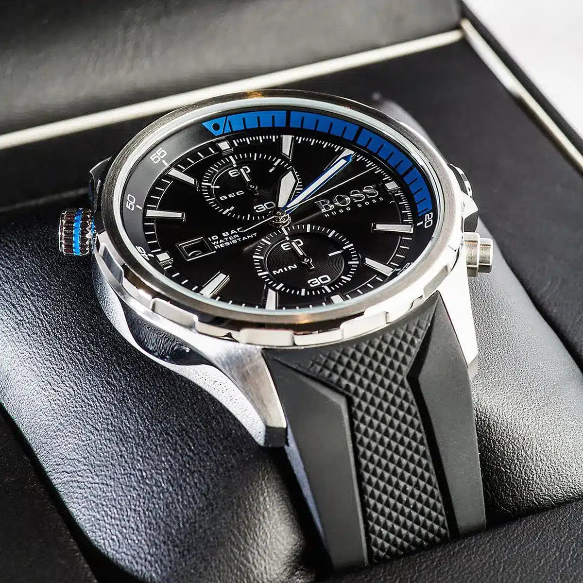 Close-up of Hugo Boss Globetrotter black dial with chronograph subdials and blue accent
