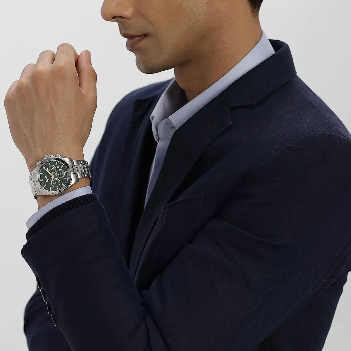Hugo Boss Hero men's watch on wrist with navy blazer and light shirt styling