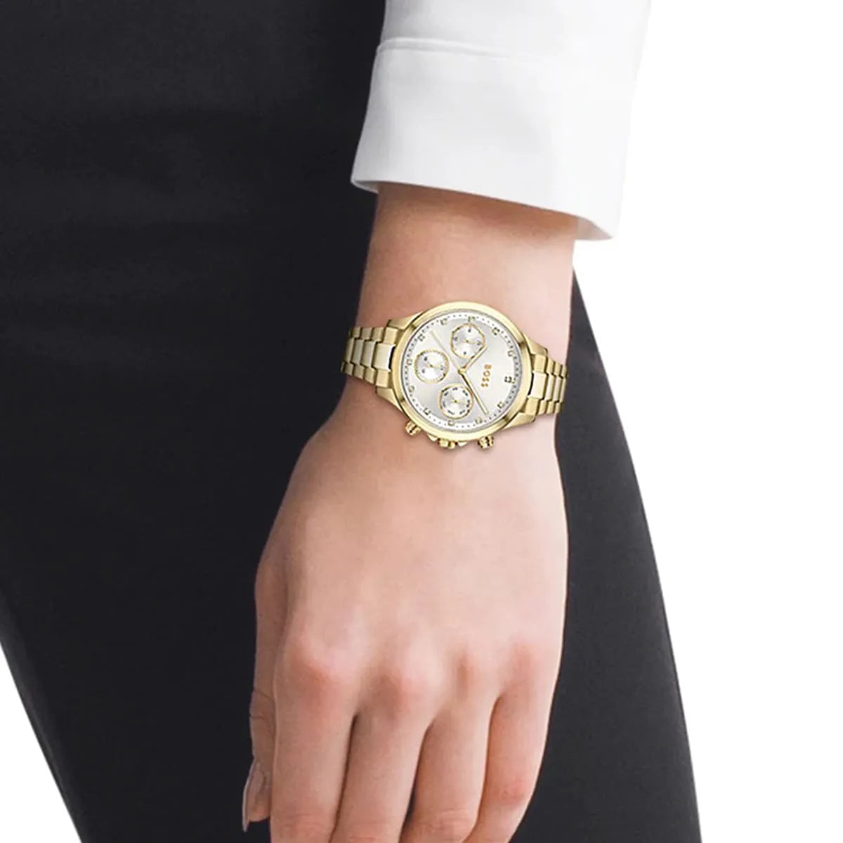 Hugo Boss Purity chronograph watch worn on wrist, gold bracelet and silver dial with three subdials visible