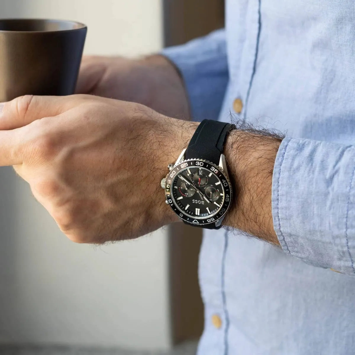 Hugo Boss Runner men's watch worn on wrist with black rubber strap