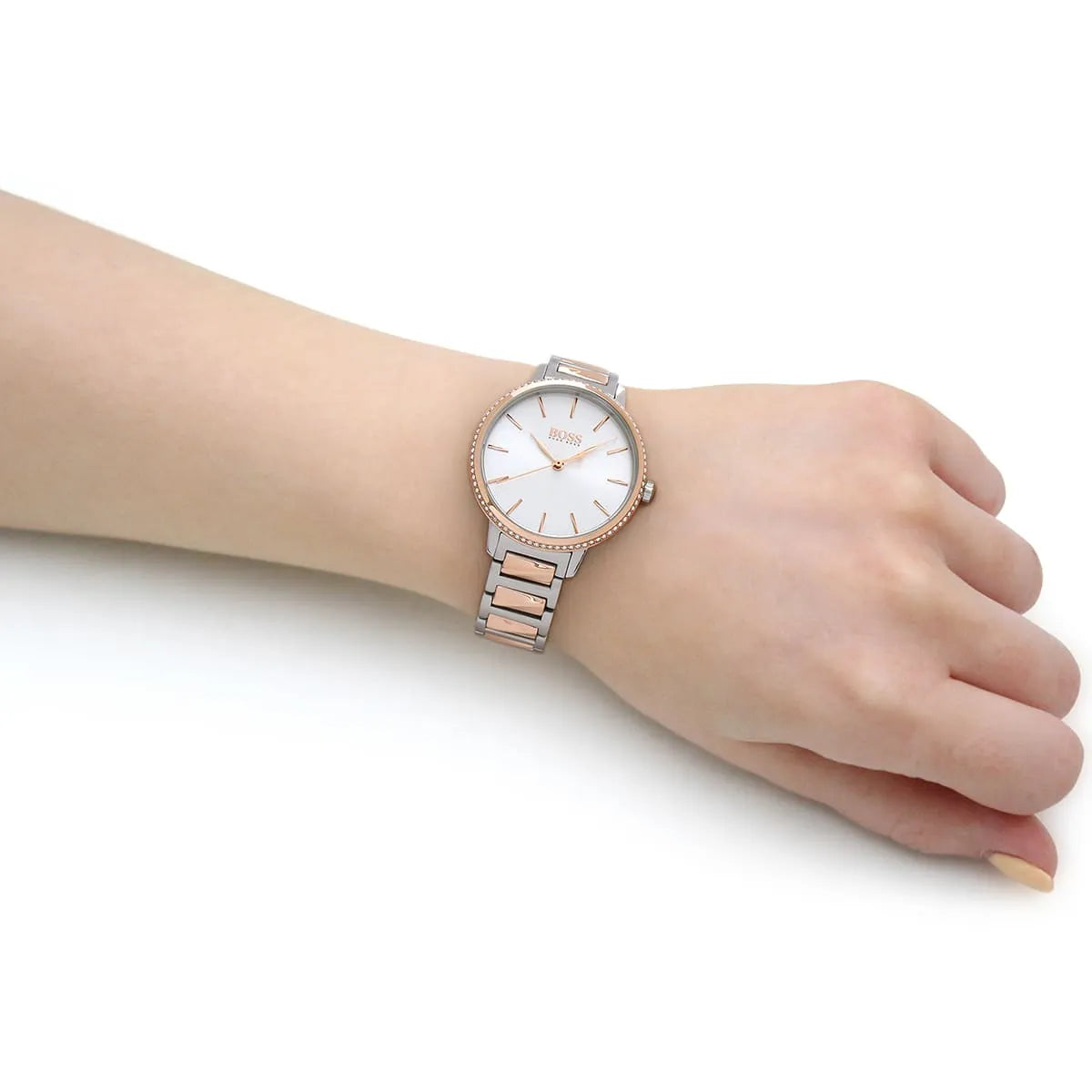 Hugo Boss Signature watch worn on wrist showing silver dial and two-tone strap