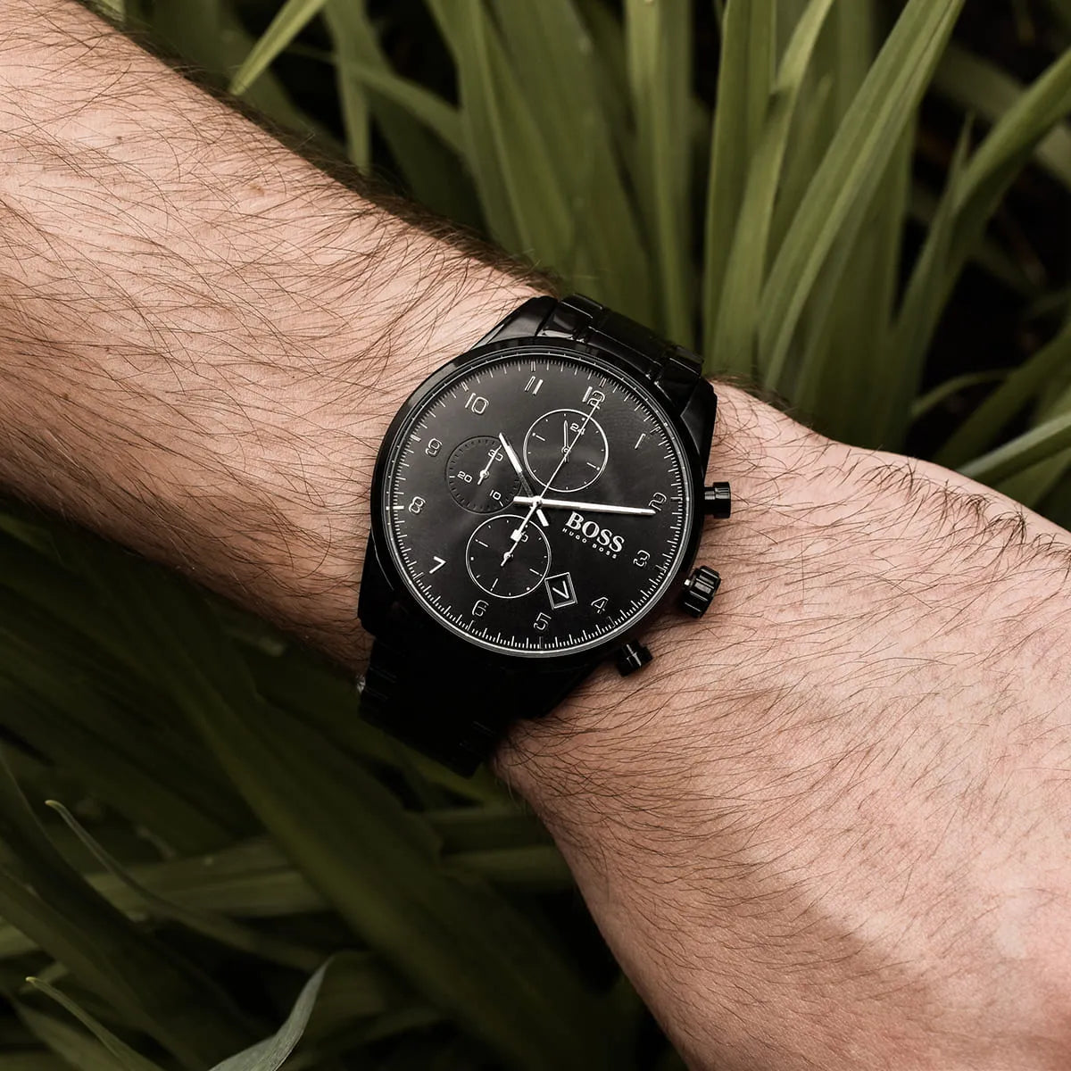 Hugo Boss Skymaster chronograph watch worn on wrist showing black dial and bracelet