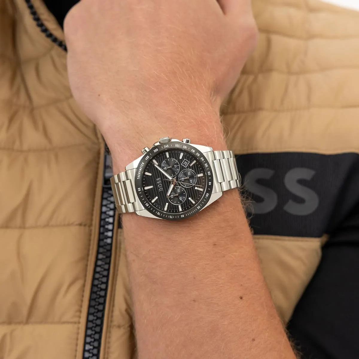 Hugo Boss Strike chronograph watch worn on wrist with black dial and steel band