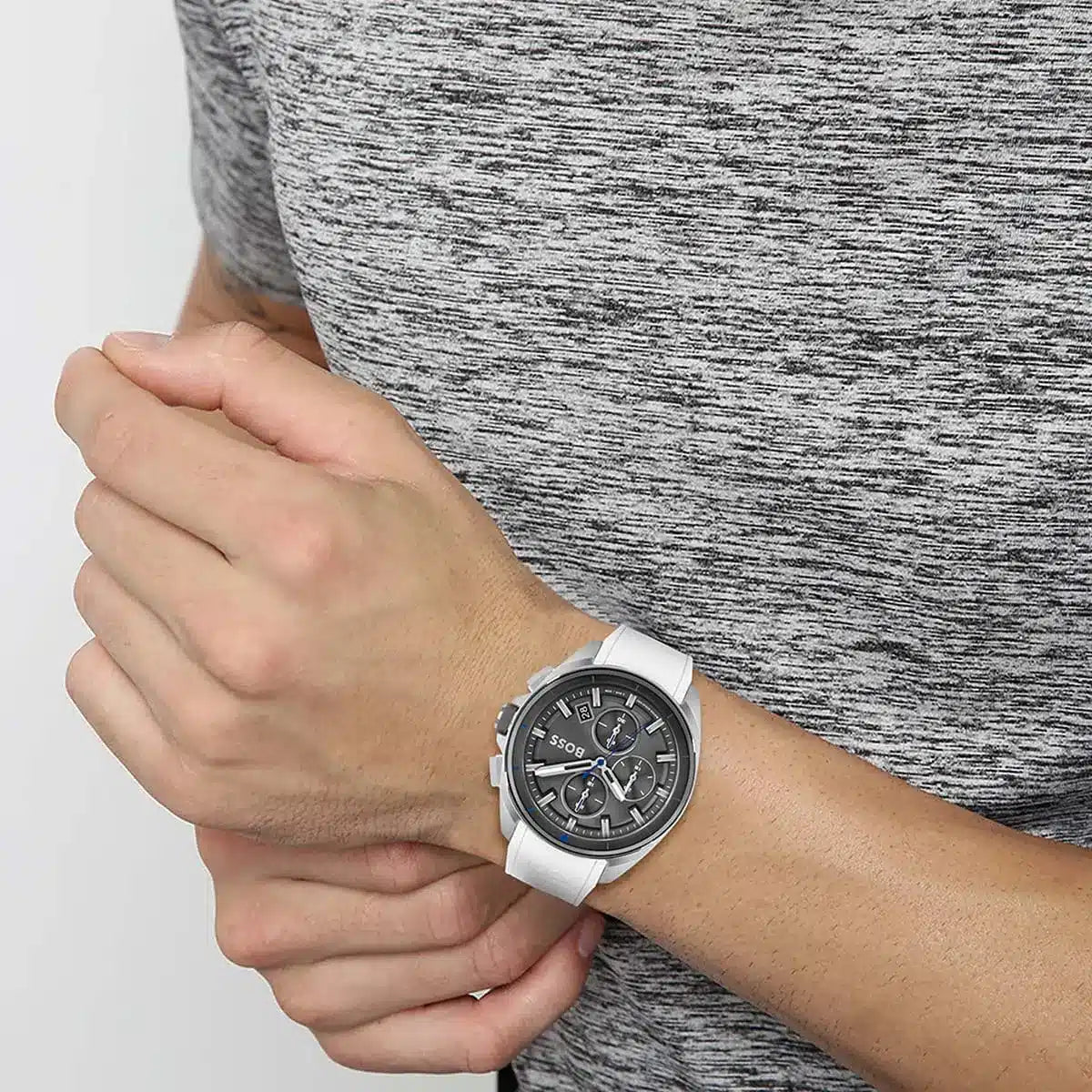 Hugo Boss Volane chronograph on wrist showing chronograph subdials and white strap