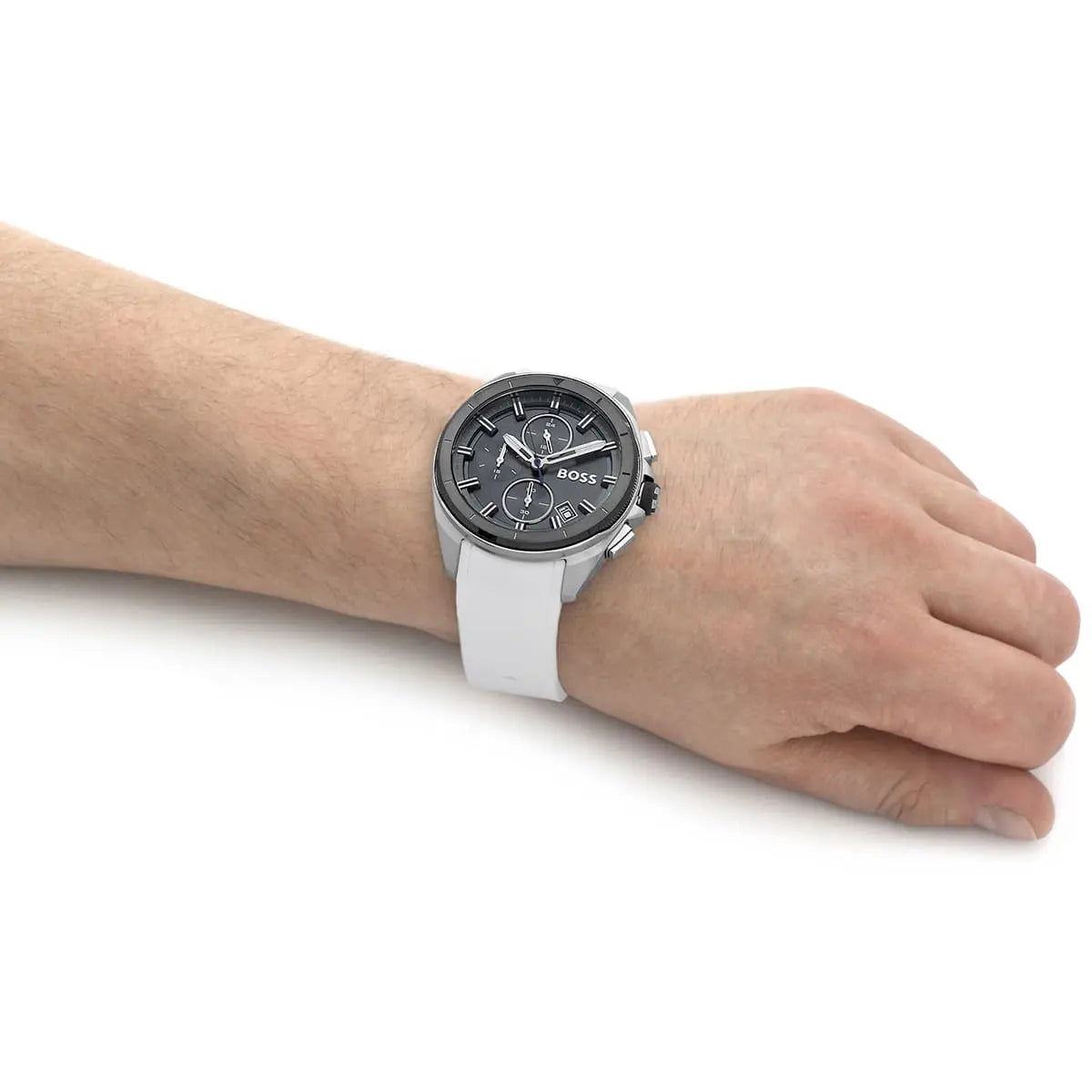Hugo Boss Volane chronograph worn on wrist showing grey dial with white strap