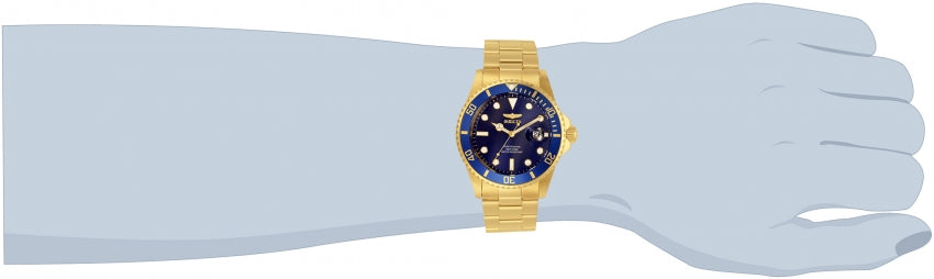 Invicta Pro Diver watch worn on wrist showing blue dial and gold bracelet