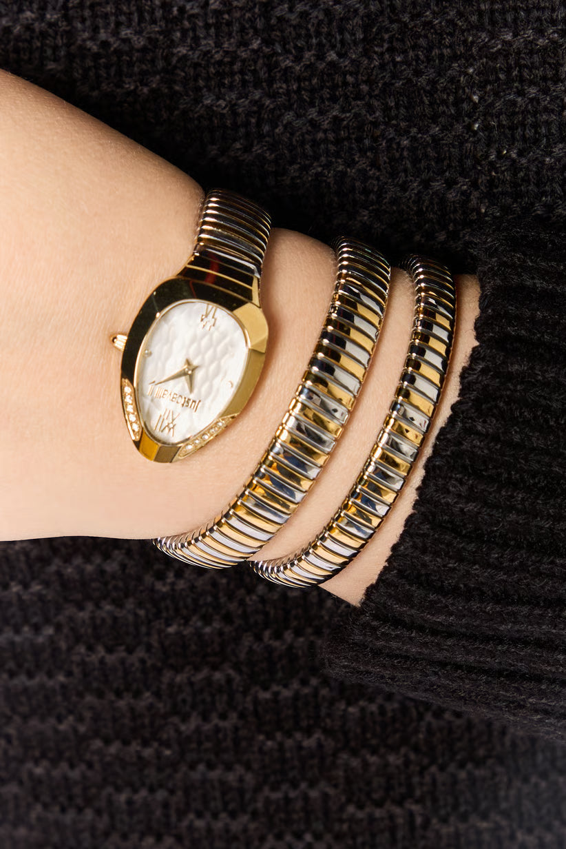 Just Cavalli Glam Evo 9 watch worn on wrist with matching snake bracelets in two-tone finish