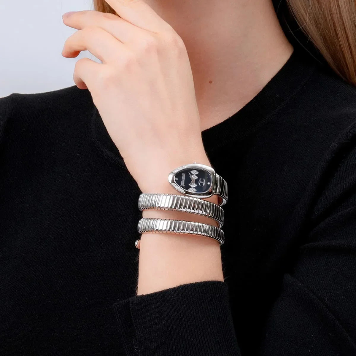 Just Cavalli Vezzoso women's watch worn on wrist with triple-wrap snake strap