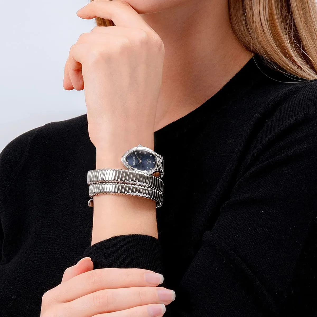 Just Cavalli Classico Lungo blue dial watch on wrist with silver coiled strap