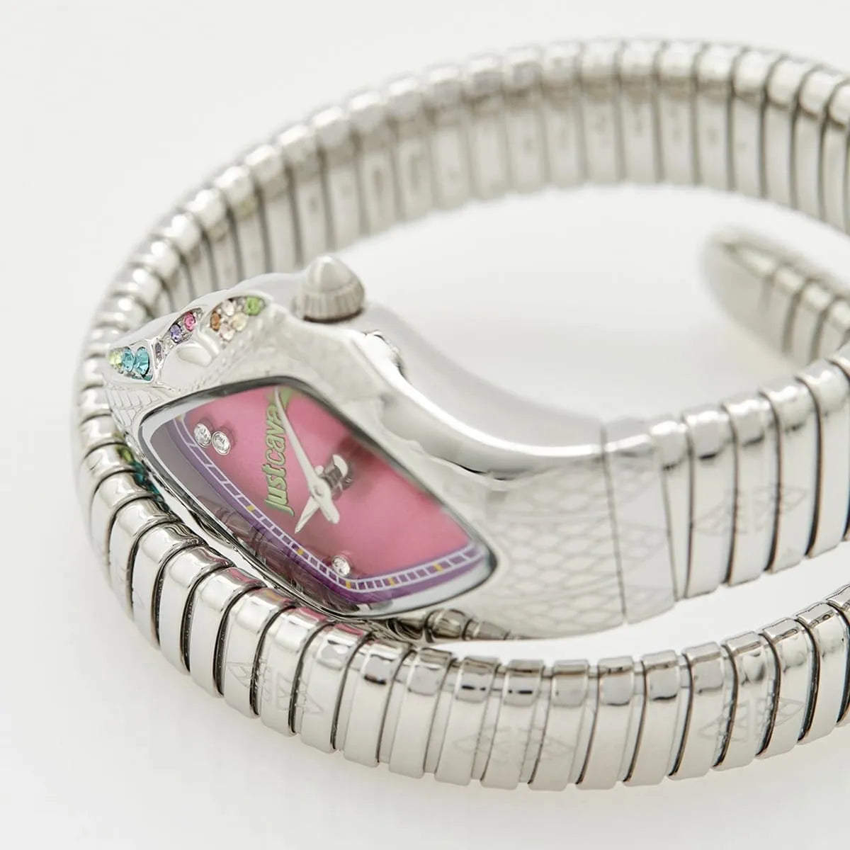 Angled view of Just Cavalli Ferocious watch showing pink dial with crystal accents and snake-textured case