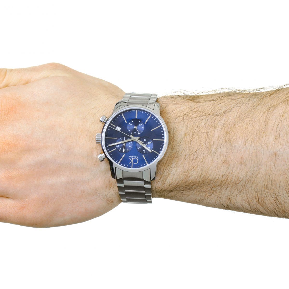 Calvin Klein City chronograph watch worn on male wrist showing dial and fit