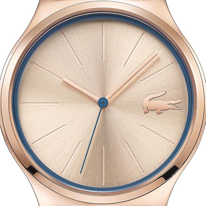 Close-up of Lacoste watch dial with champagne face and rose gold case
