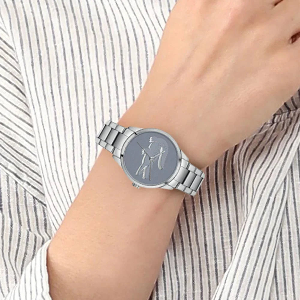 Lacoste women's watch worn on wrist with stainless steel bracelet