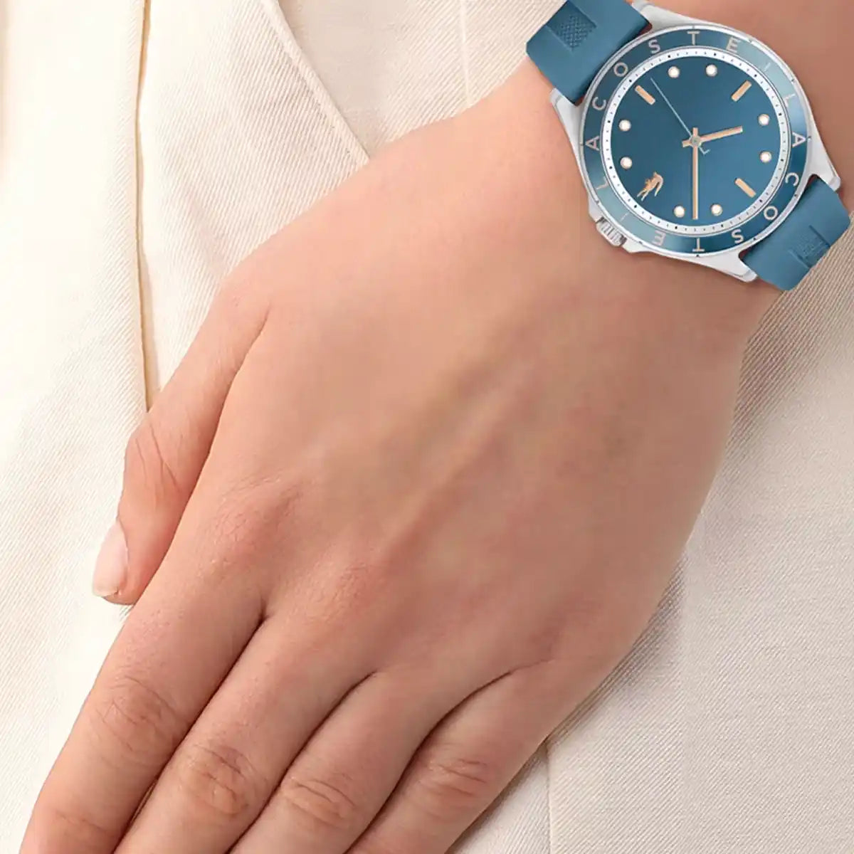 Lacoste 2001267 women's watch worn on wrist with blue dial and rubber strap