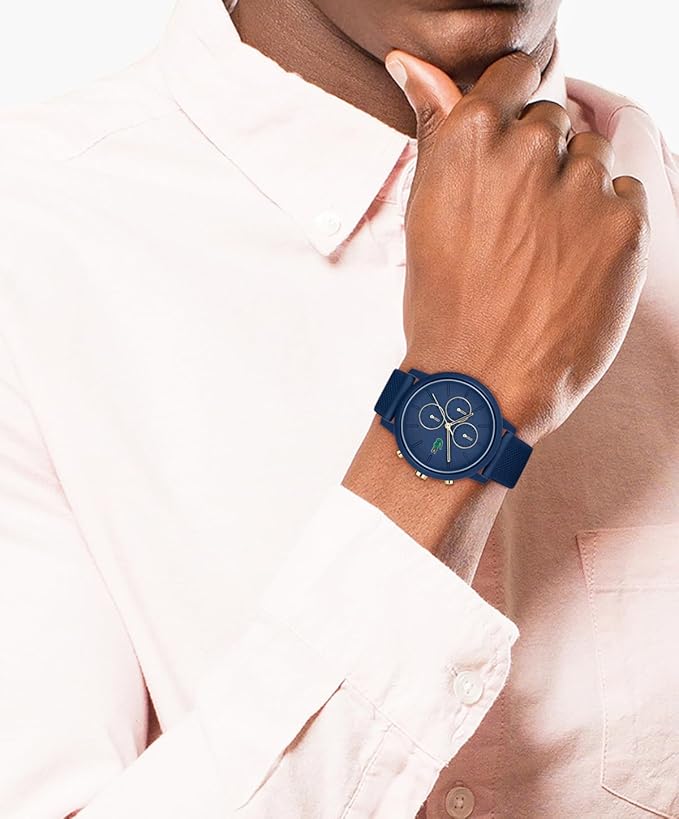 Lacoste chronograph watch worn on wrist with blue silicone band