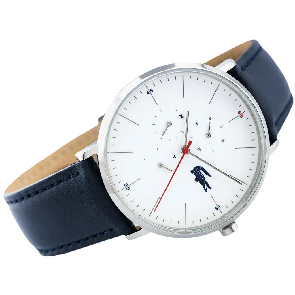 Angled view of Lacoste Moon watch showing silver case, white dial, and navy leather strap