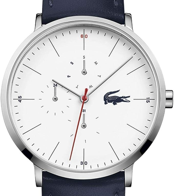 Close-up of Lacoste Moon chronograph dial with white face, red center hand, and crocodile logo