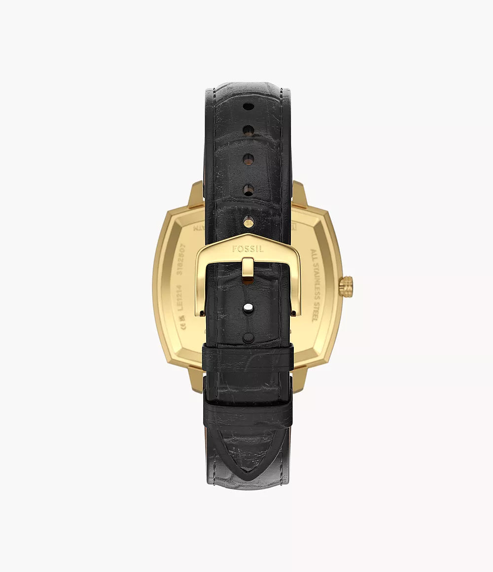 Caseback view of Fossil Machine Luxe showing gold-tone case and black croco leather strap