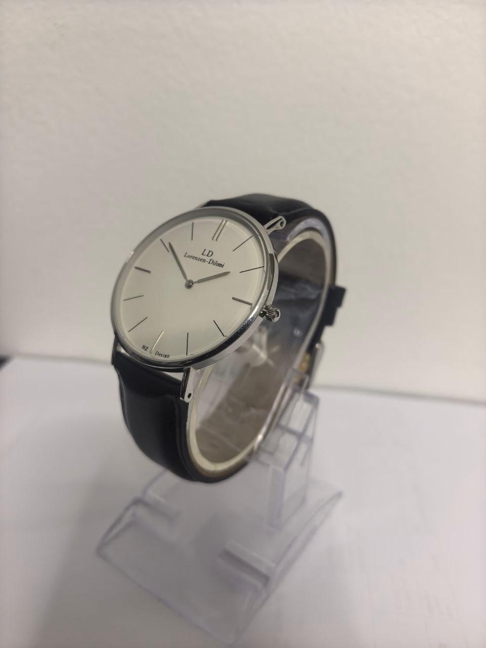 Lorenzen Dilimi watch displayed on wrist stand with black leather strap