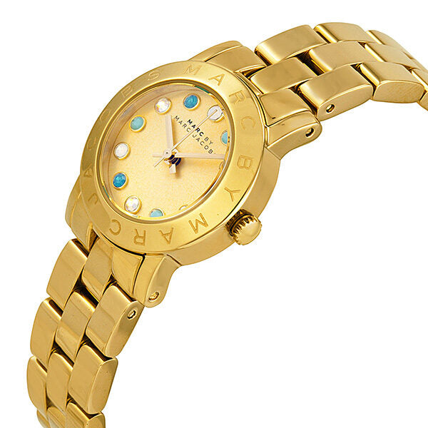 Side angle view of Amy gold tone watch showing dial and bracelet detail