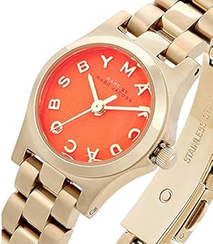 Marc by Marc Jacobs Henry Dinky watch angled view showing orange dial and gold-tone strap