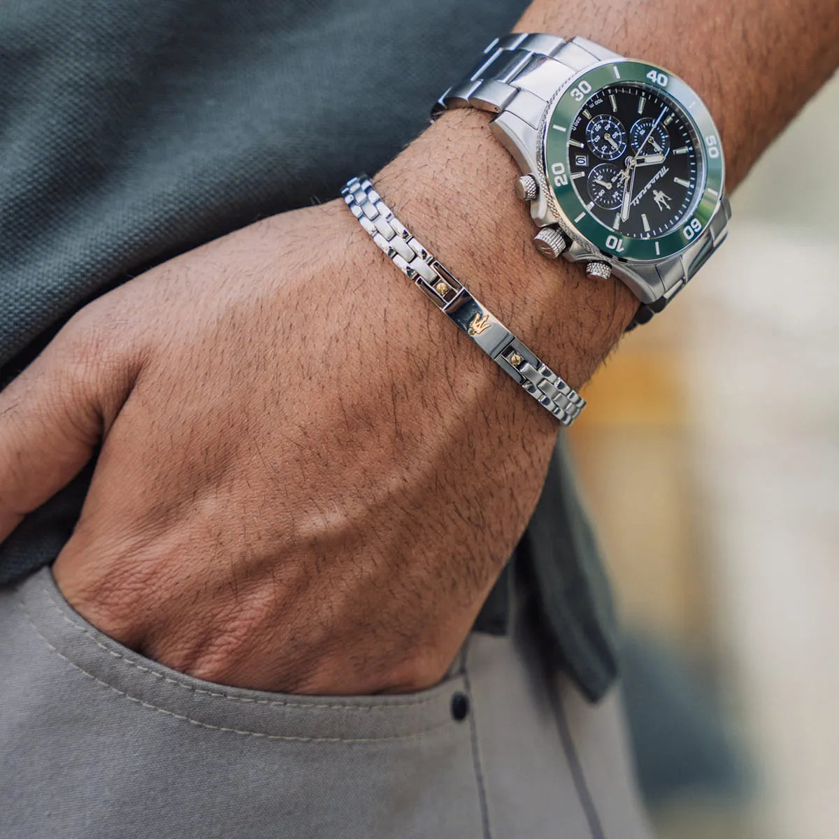 Maserati Competizione chronograph watch worn on wrist with black dial and green bezel visible