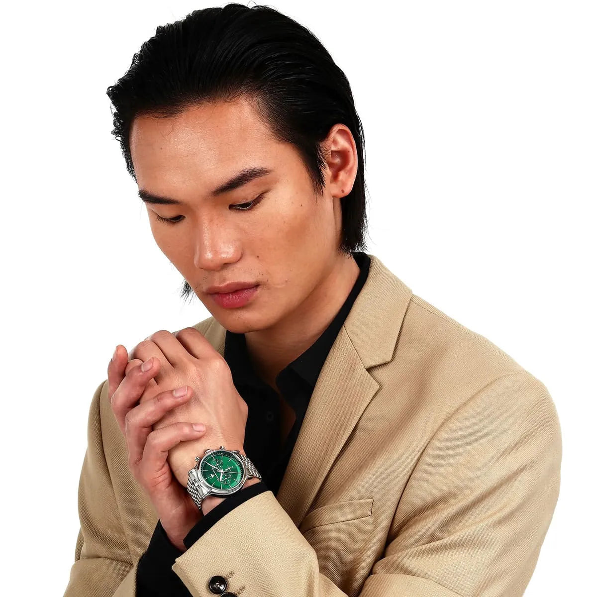 Maserati Epoca chronograph watch on wrist displaying green dial and chronograph subdials