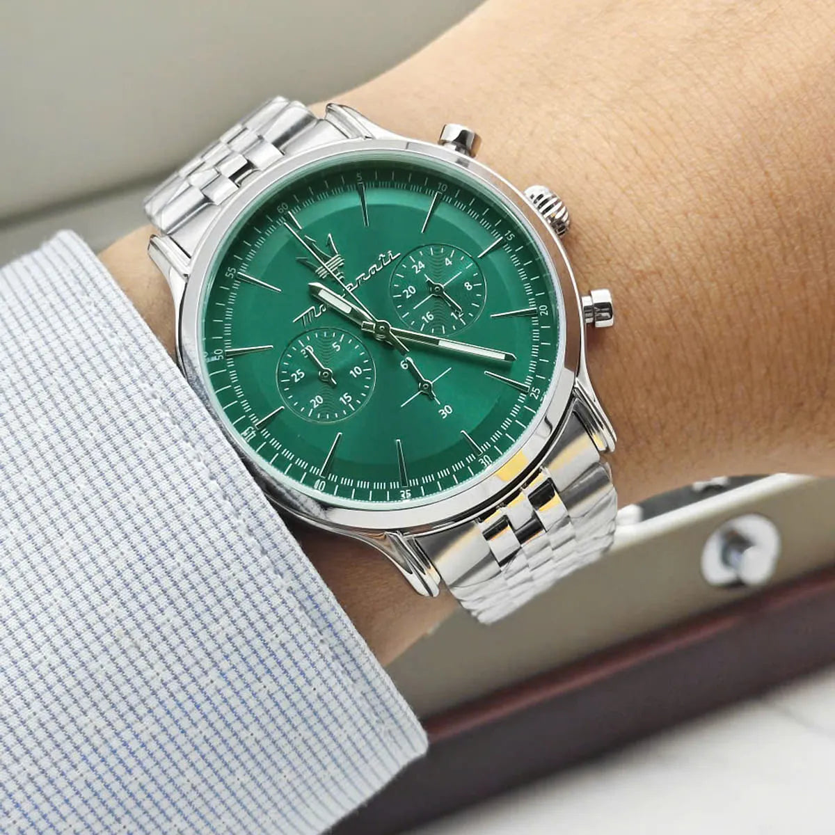 Maserati Epoca chronograph watch worn on wrist with green dial detail visible