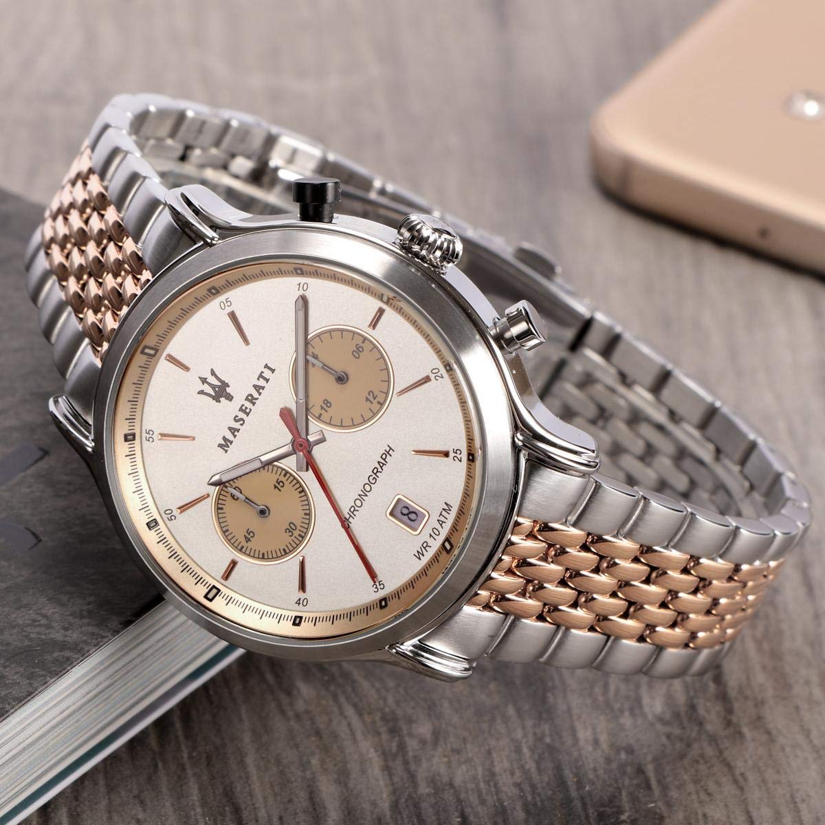 Maserati Legend 42mm chronograph on wrist with ivory dial and two-tone mixed metal bracelet