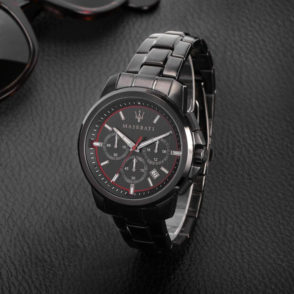 Maserati chronograph watch worn on wrist showing black bracelet and dial detail