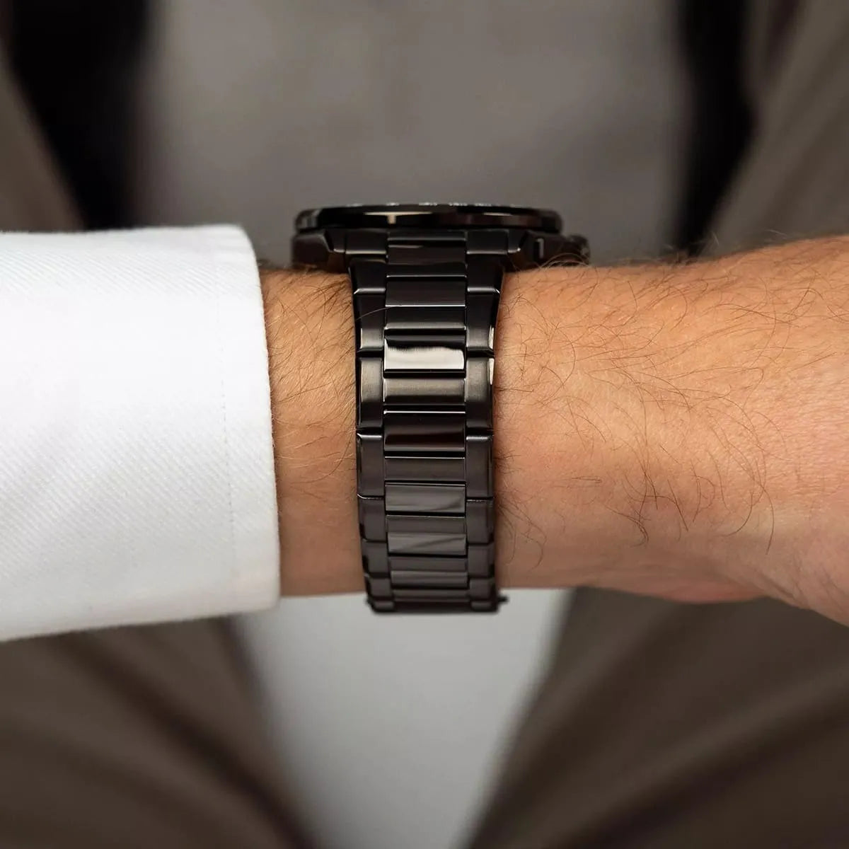Maserati Velocità watch worn on wrist displaying gunmetal stainless steel bracelet