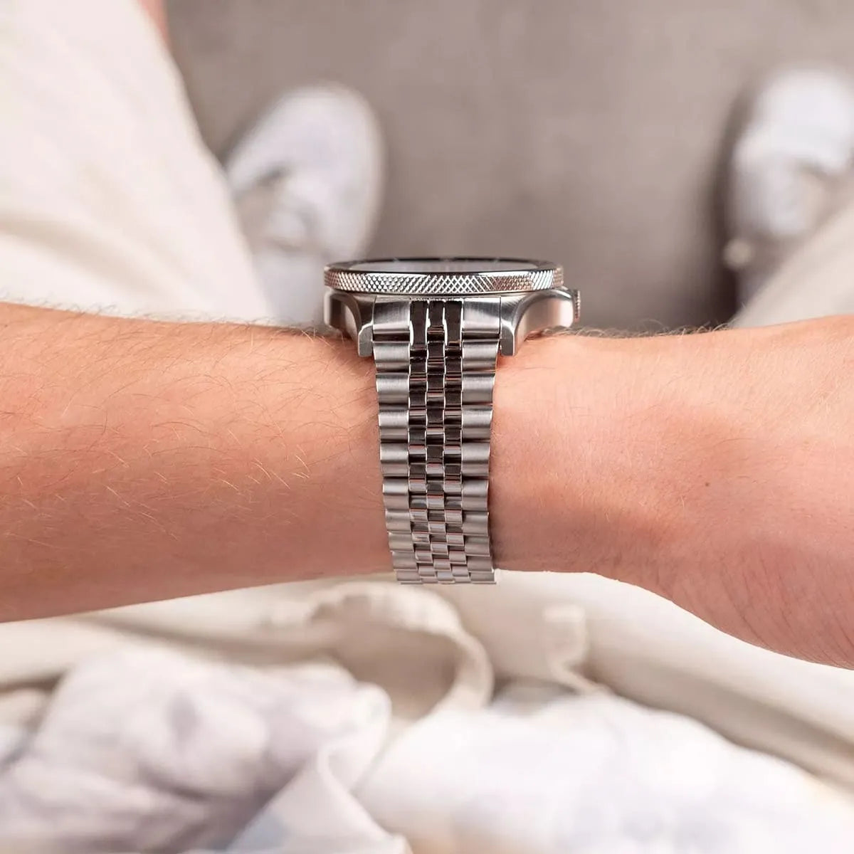 Maserati Sfida watch on wrist showing side profile of silver stainless steel bracelet