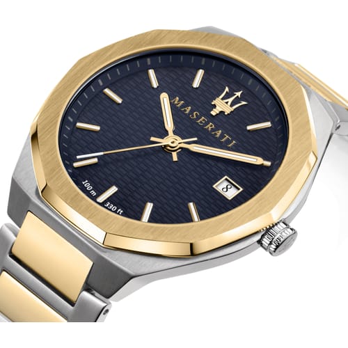 Close-up angle view of Maserati Stile watch showing blue sunburst dial and gold case details