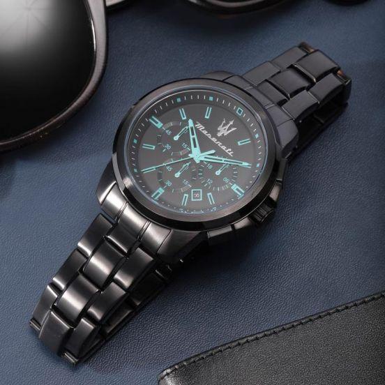 Maserati Successo Aqua Edition chronograph watch on wrist with black bracelet and blue background